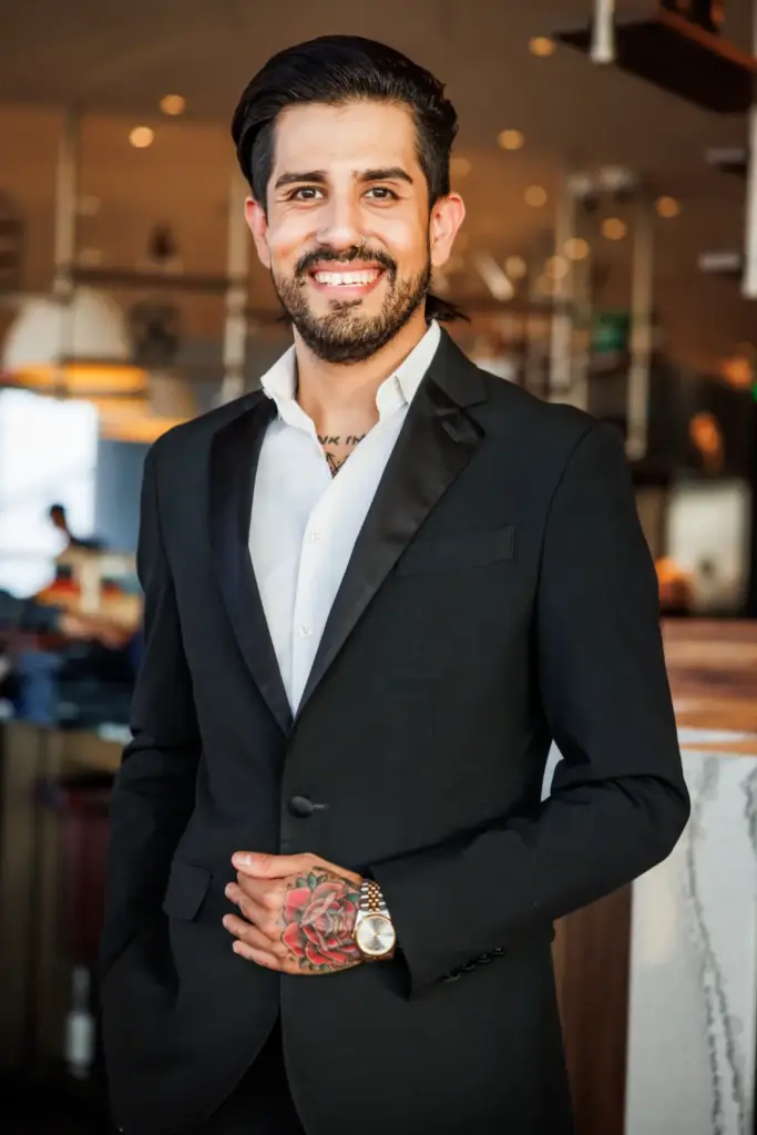 Portrait of Noel Sanchez the Director of Banquets for Crown Block Steakhouse in Dallas Texas.
