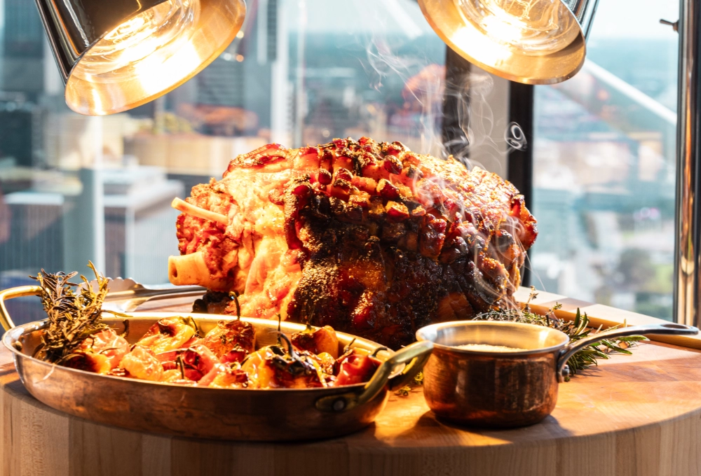 Bone-In Smoked Ham hand carved at live carving station at Crown Block Dallas Sunday Brunch.