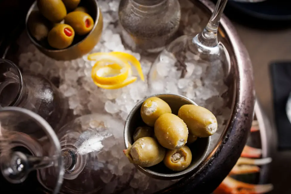 crown block tower hour tini olives lemon twist